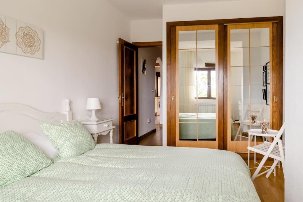 Casa De Las Flores - Apartamento Con Jardin Privado Frente A La Playa De Comillas Ngoại thất bức ảnh