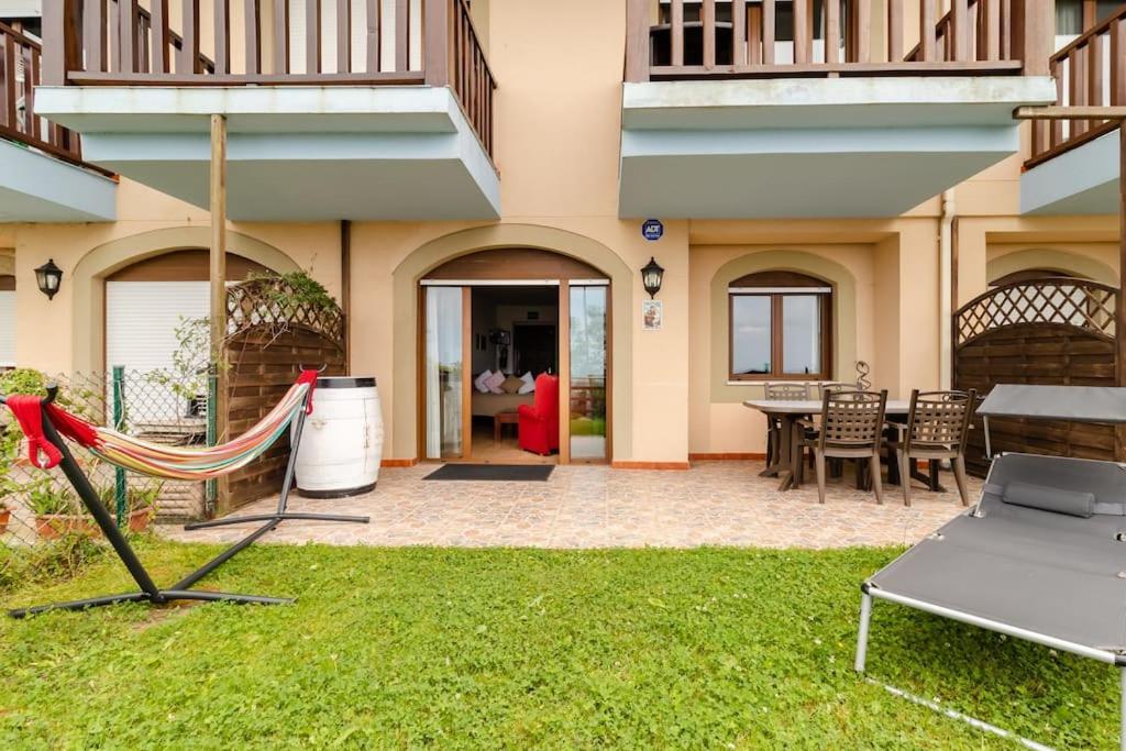 Casa De Las Flores - Apartamento Con Jardin Privado Frente A La Playa De Comillas Ngoại thất bức ảnh